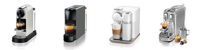 Fyra olika nespresso-kaffemaskiner. 